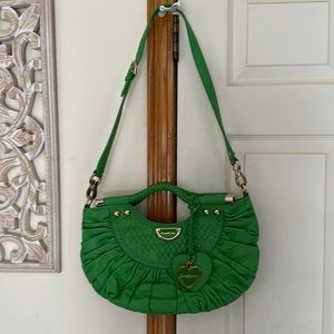 Bebe light green leather round bag small handles long strap braided detailing
